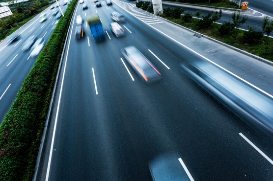 image of cars driving on a highway